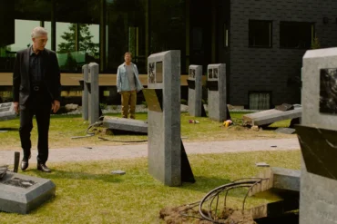 The Shrouds (2025) Karsh (Vincent Cassel) and Maury (Guy Pearce) investigate the GraveTech Attach